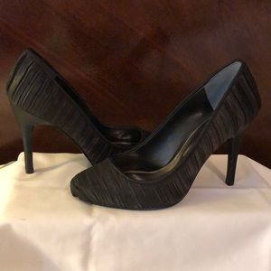 Black pleated satin heels. Size 7.5